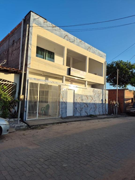a building on the side of a street at Manancial de Aguas V in Barreirinhas