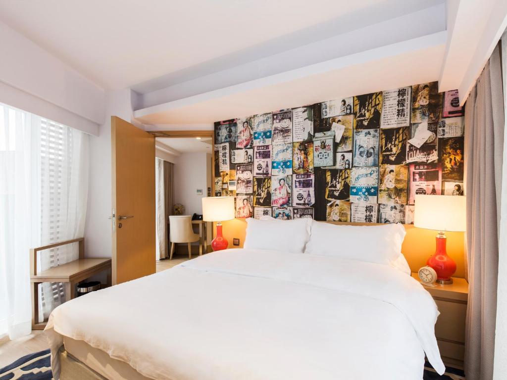 Voodi või voodid majutusasutuse Caravel Hotel toas