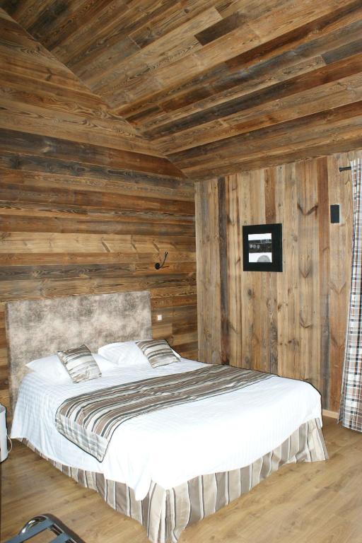 Postel nebo postele na pokoji v ubytování Hotel Blanc