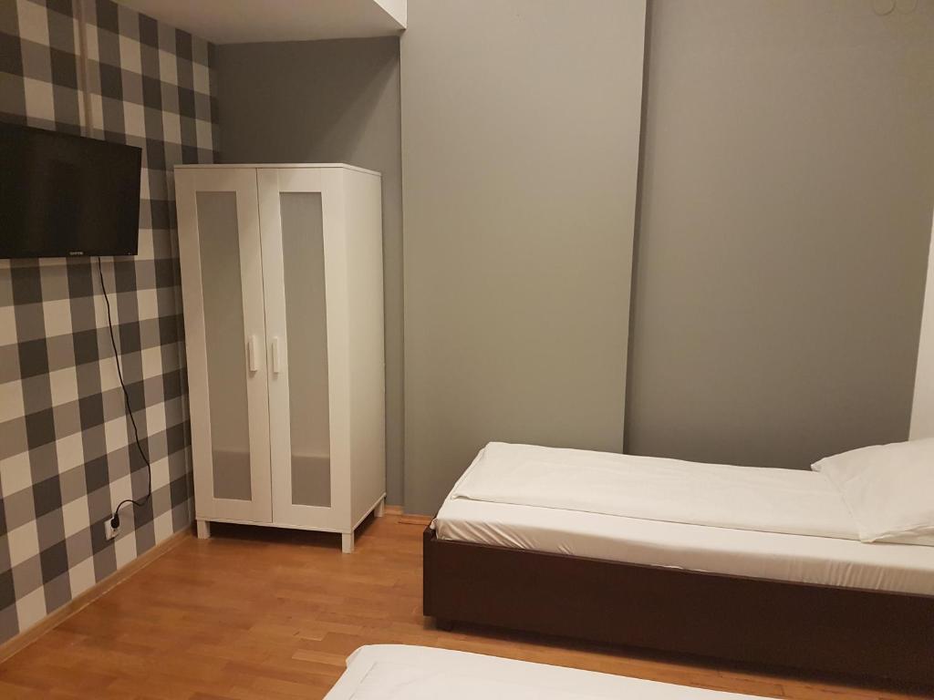 Postel nebo postele na pokoji v ubytování Duszka Hostel
