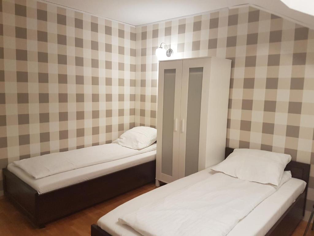 Postel nebo postele na pokoji v ubytování Duszka Hostel