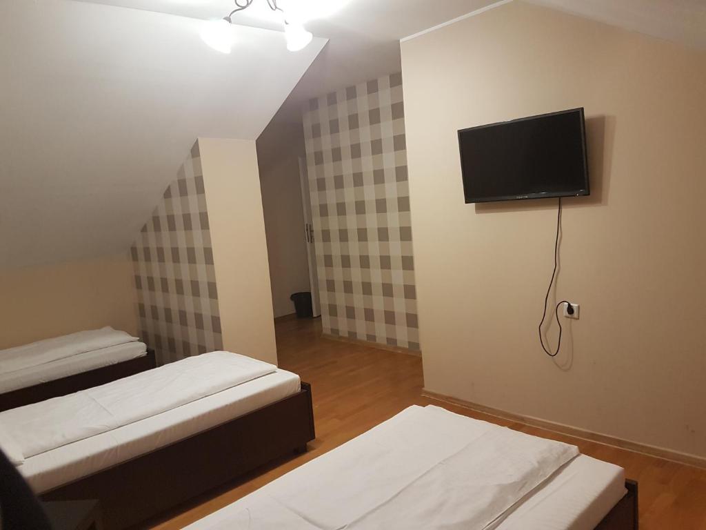 TV a/nebo společenská místnost v ubytování Duszka Hostel