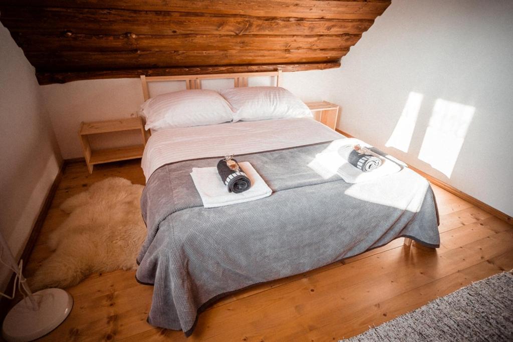 Postel nebo postele na pokoji v ubytování Chata nad Briežkami