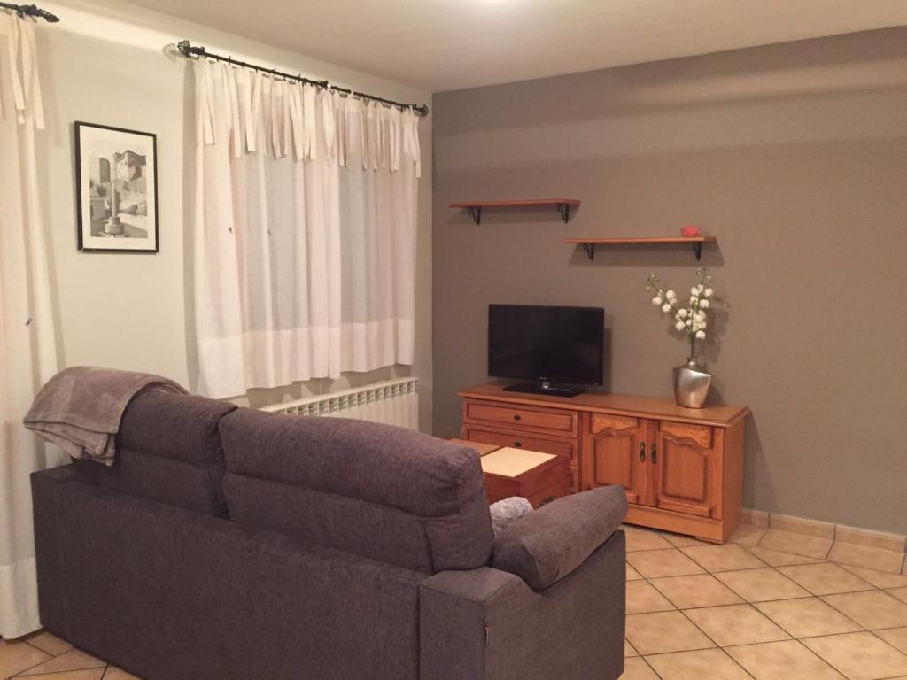 TV a/nebo společenská místnost v ubytování Apartamentos Residencial Fornocal