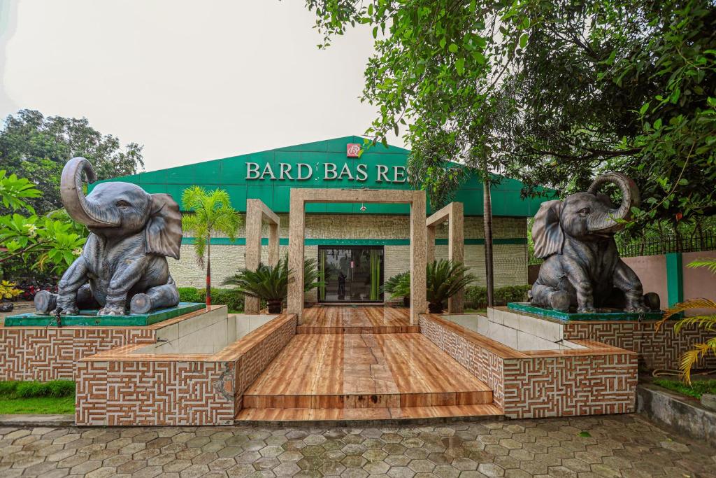two statues of elephants in front of a building at Bardibas Resort in Tulsi