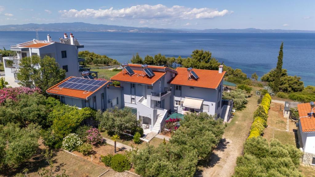 an aerial view of a house with solar panels on its roof at Elegant Maisonettes Elena in Nea Potidaea