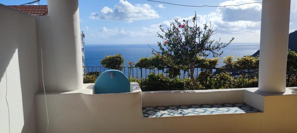 a view of the ocean from a balcony at Melania Home II in Filicudi