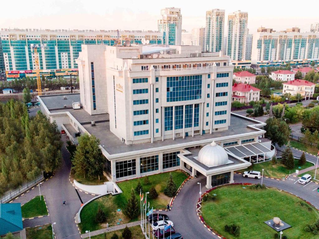 an overhead view of a large building in a city at Rixos President Hotel Astana in Astana