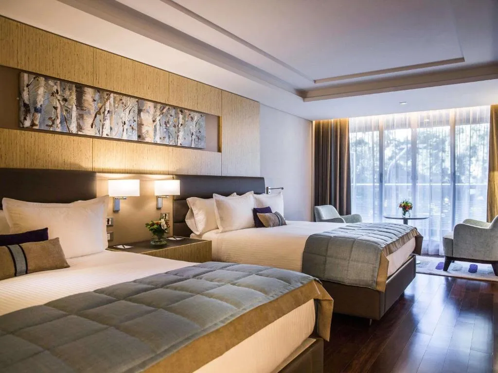 Deluxe Suite with Two Double Beds, Balcony and Park View