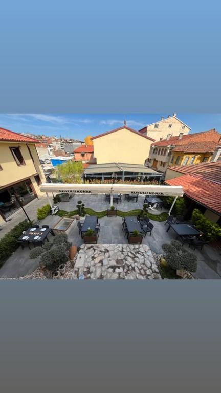 an overhead view of a patio with chairs and tables at kuyulu konak in Uşak