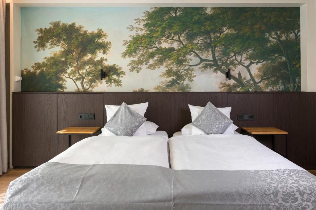 Ліжко або ліжка в номері Hotel Brimer
