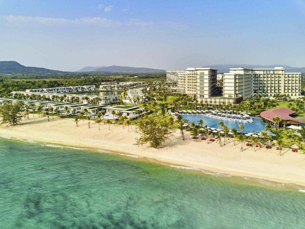 an aerial view of a resort on the beach at Mövenpick Resort Waverly Phu Quoc in Phú Quốc