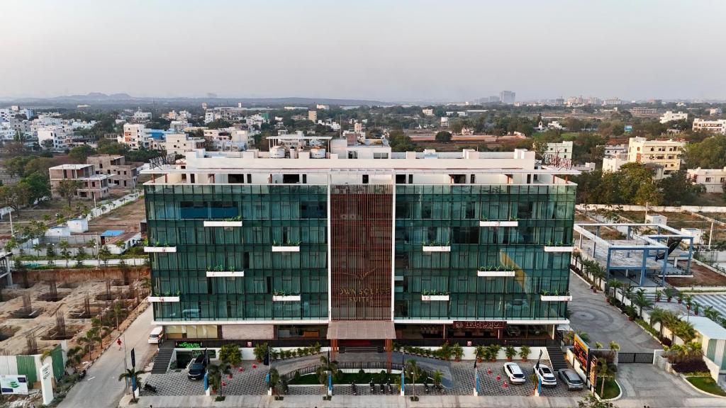 an aerial view of a building in a city at Town Square Suites in Hyderabad
