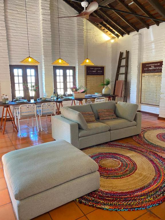 a living room with a couch and a table at Casa Merino in Évora