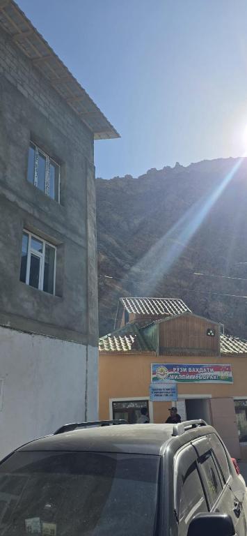 a truck parked in front of a building at Eraj Bibi Fatima in Yamchin