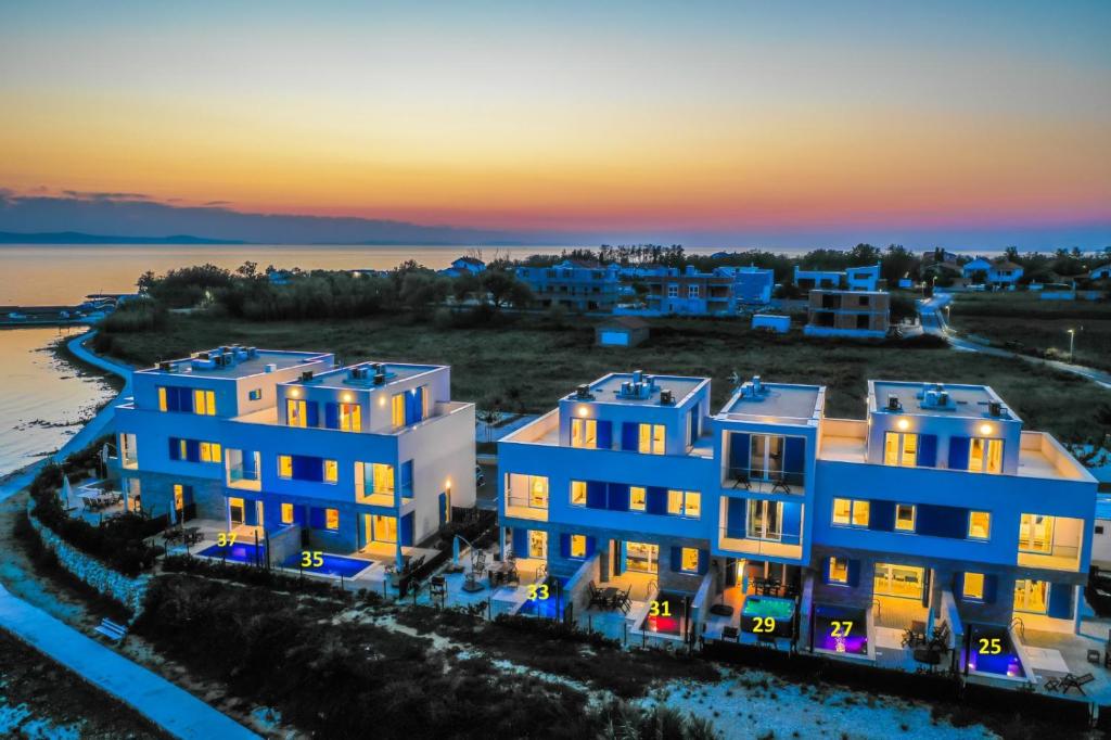 an aerial view of a building at sunset at Villa Miri Orchid in Privlaka