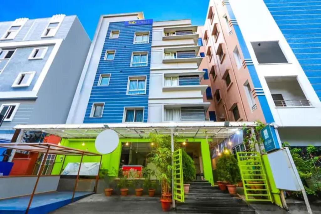 a view of a building from the street at FabHotel Blue Dawn Gachibowli in Gachibowli