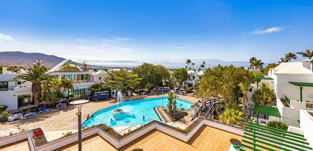 an aerial view of a swimming pool at a resort at THB Royal in Playa Blanca