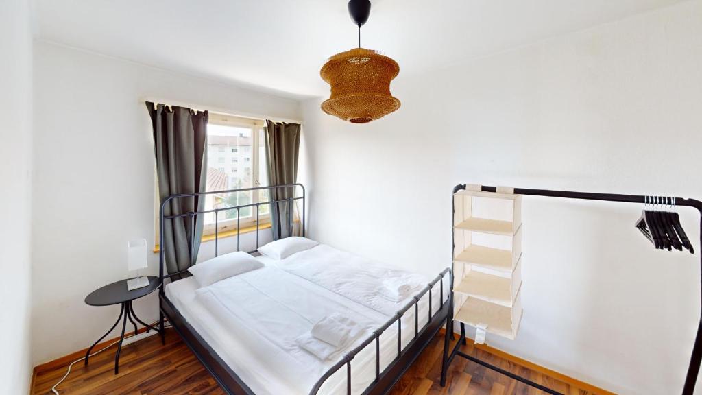 a bedroom with a bunk bed and a lamp at Charming 3 Bedroom Retreat in Zurich