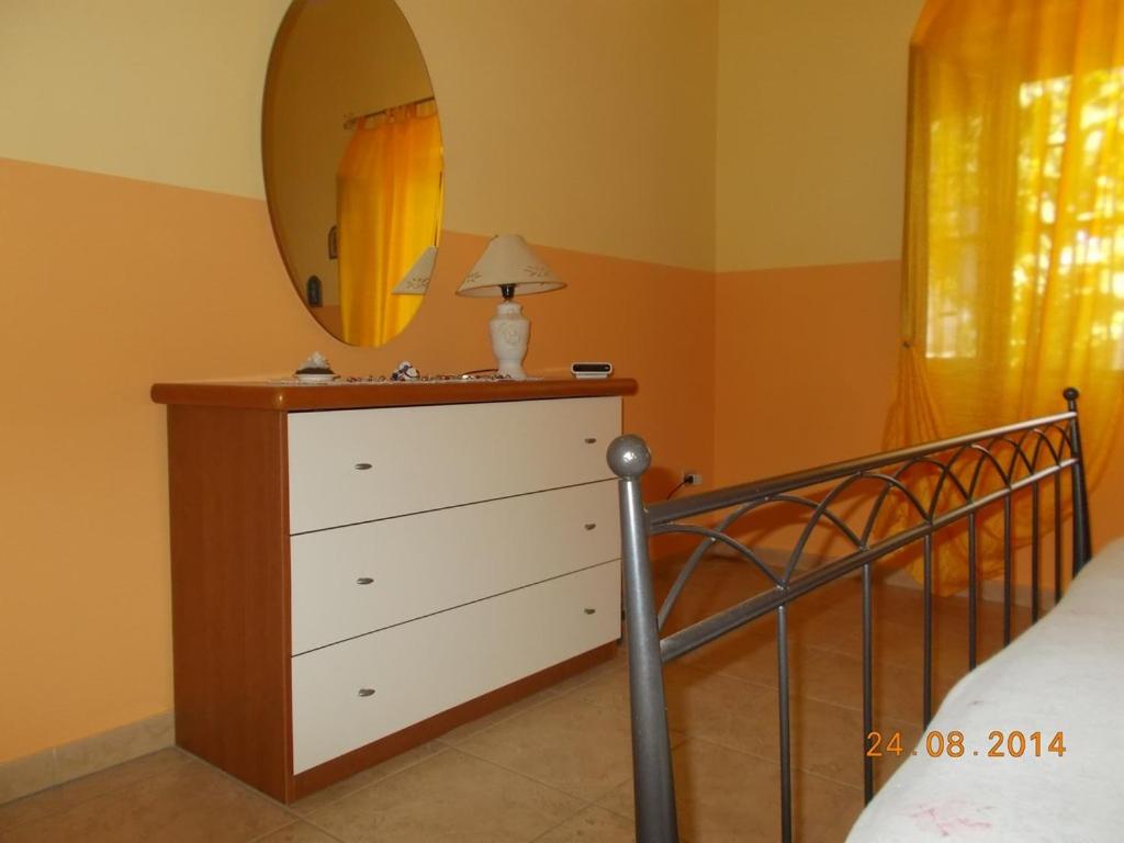Postel nebo postele na pokoji v ubytování Casa di Grazia
