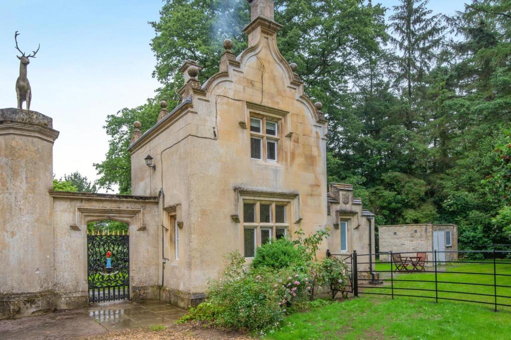 an old house with a statue of a deer on top of it at 1 Bed in Exton oc-e42799 in Exton