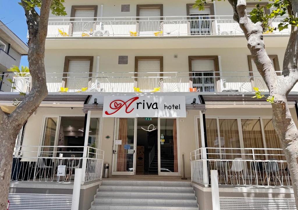 a building with a sign that reads nikko hotel at Hotel Ariva in Rimini