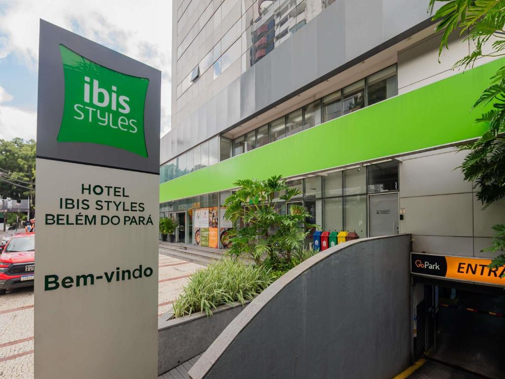 a sign in front of a building with a hospital at ibis Styles Belém do Pará in Belém