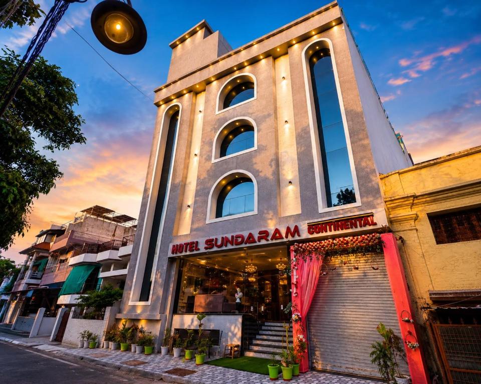 a building with a store in front of it at The Hotel Sundaram Continental in Prayagraj
