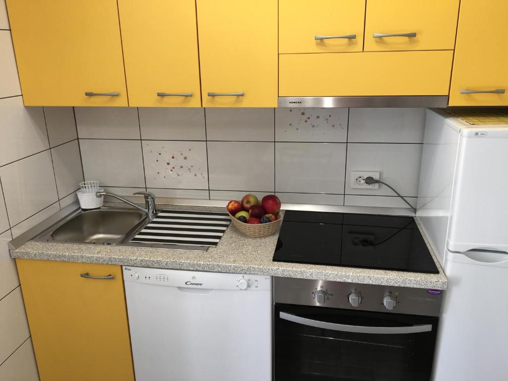 Kuchyň nebo kuchyňský kout v ubytování House Mima