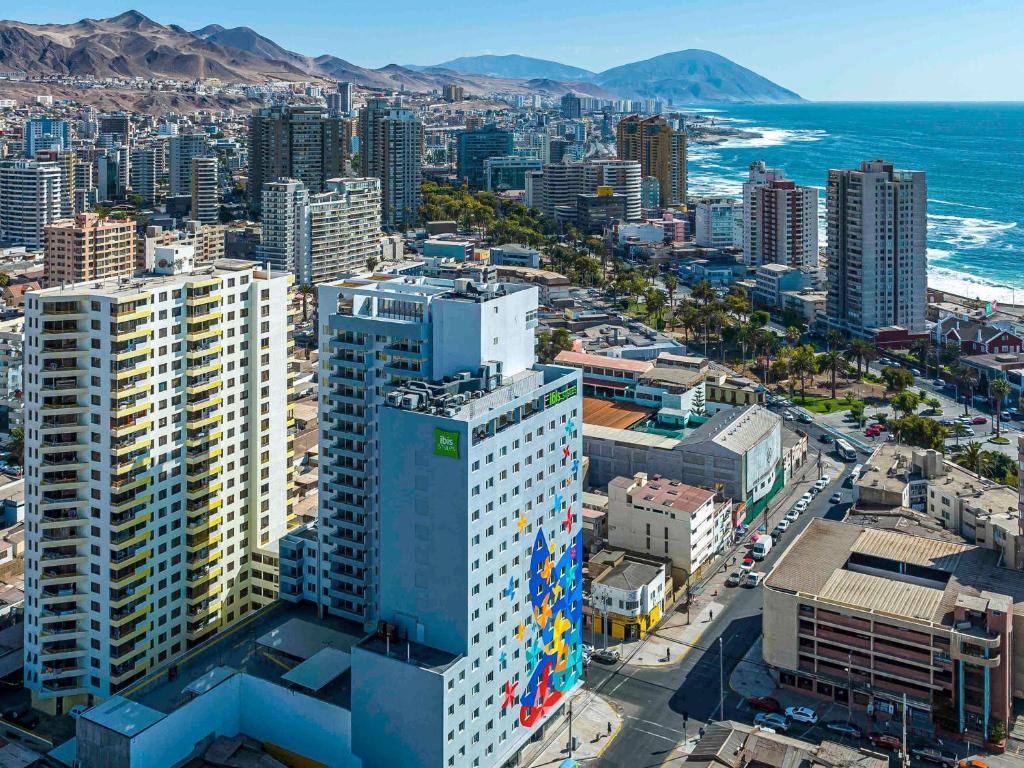 an aerial view of a city and the ocean at ibis Styles Antofagasta in Antofagasta