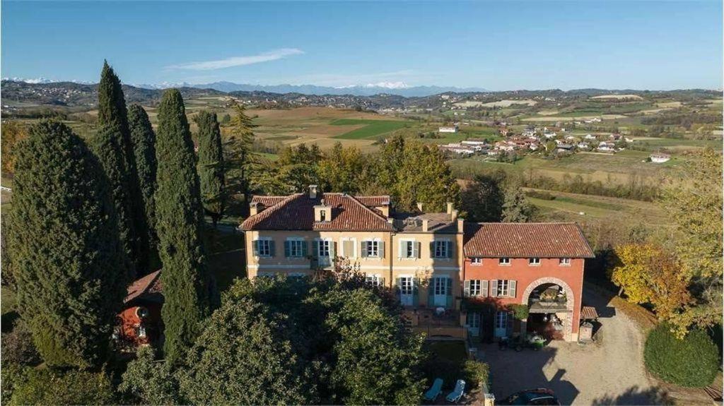 an aerial view of a large house with trees at Villa Burzio 1899 in Chieri