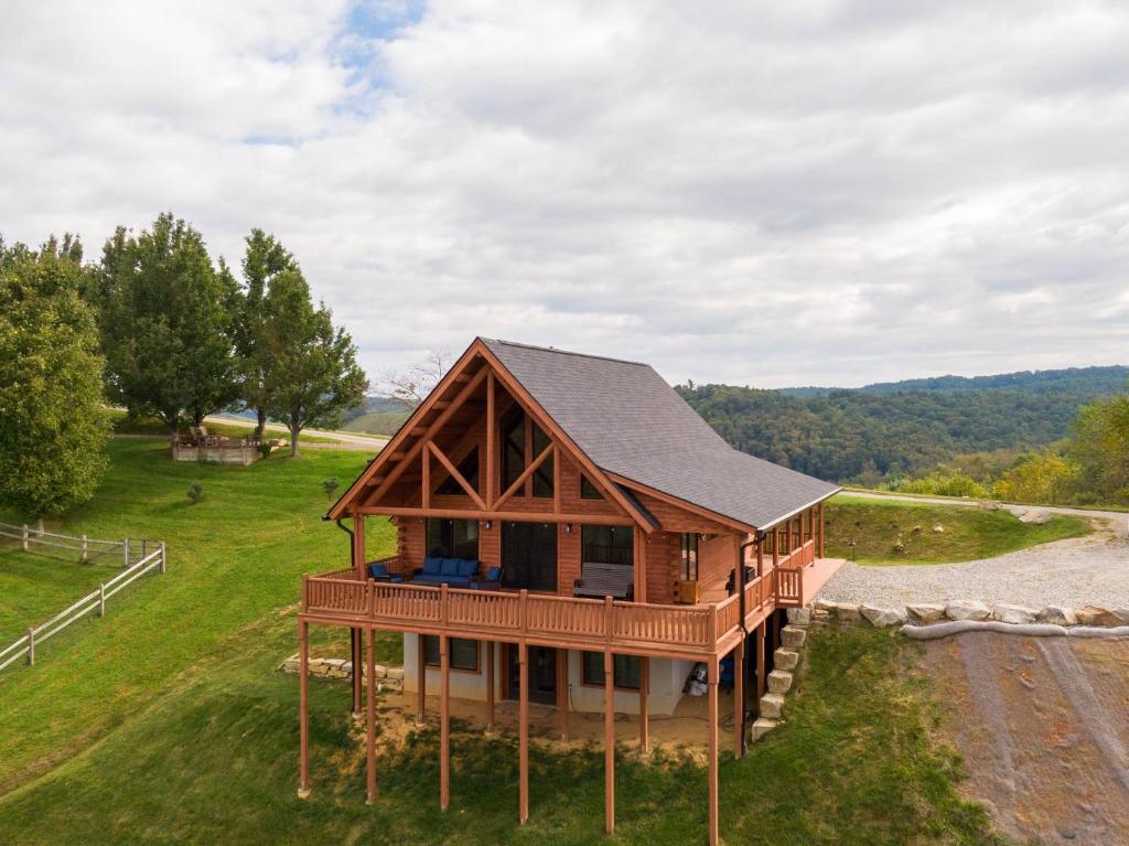 an overhead view of a house with a gambrel roof at Chasing Clouds Cabin in Todd
