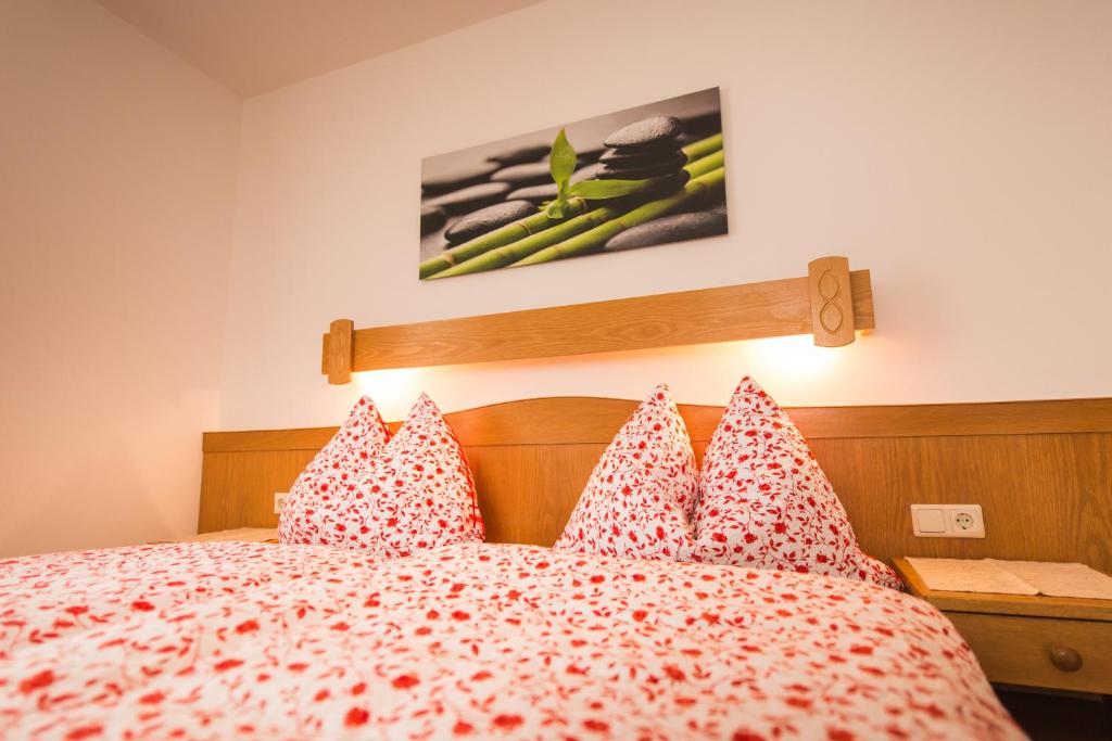 Postel nebo postele na pokoji v ubytování Hotel Pension Barbara