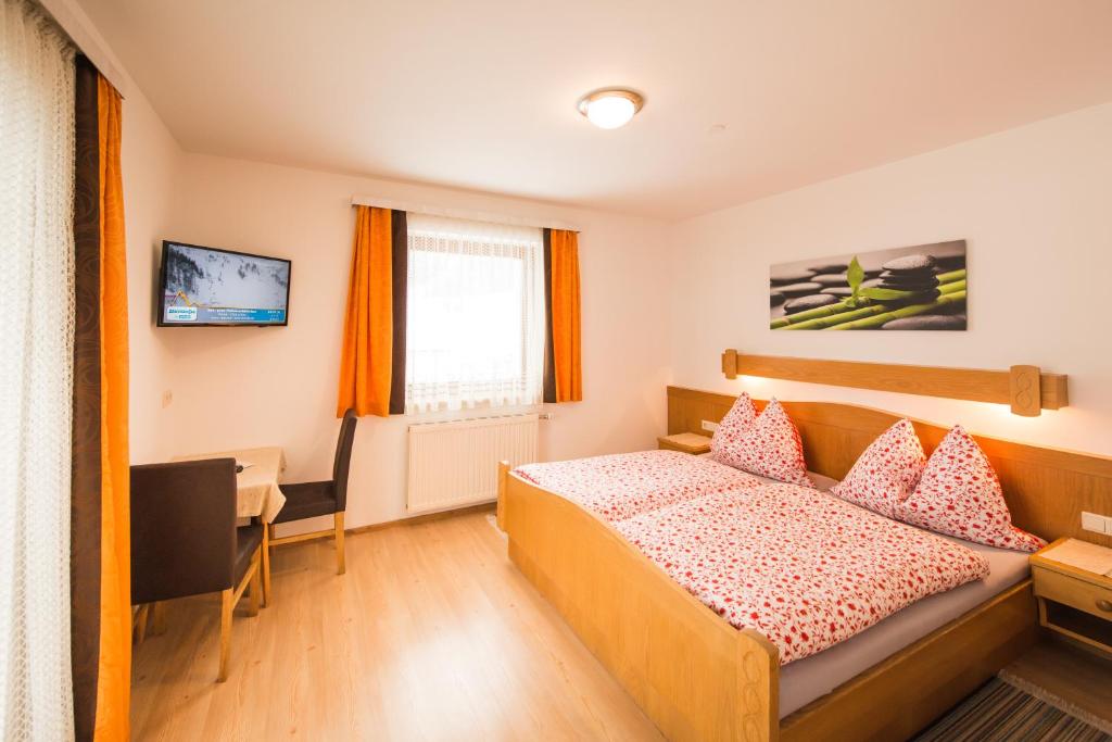 Postel nebo postele na pokoji v ubytování Hotel Pension Barbara