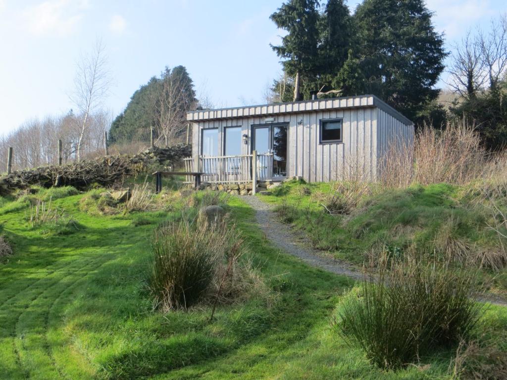 a tiny house on the side of a hill at Panorama Peace Nature in Castlewellan