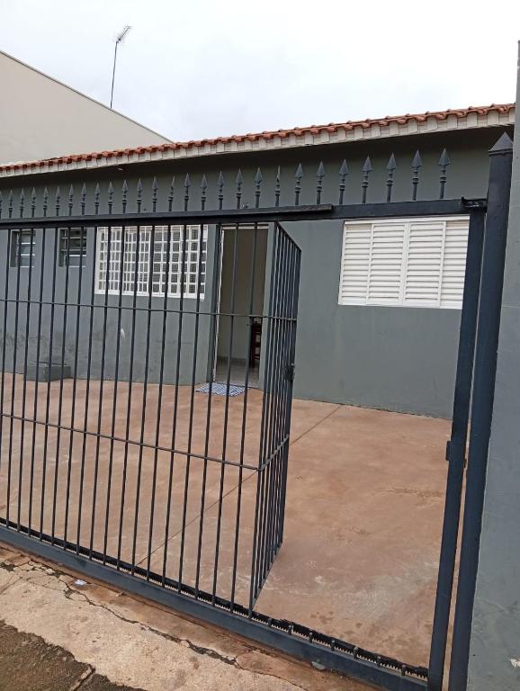 a gate in front of a building at Apartamento 45A in Paulínia