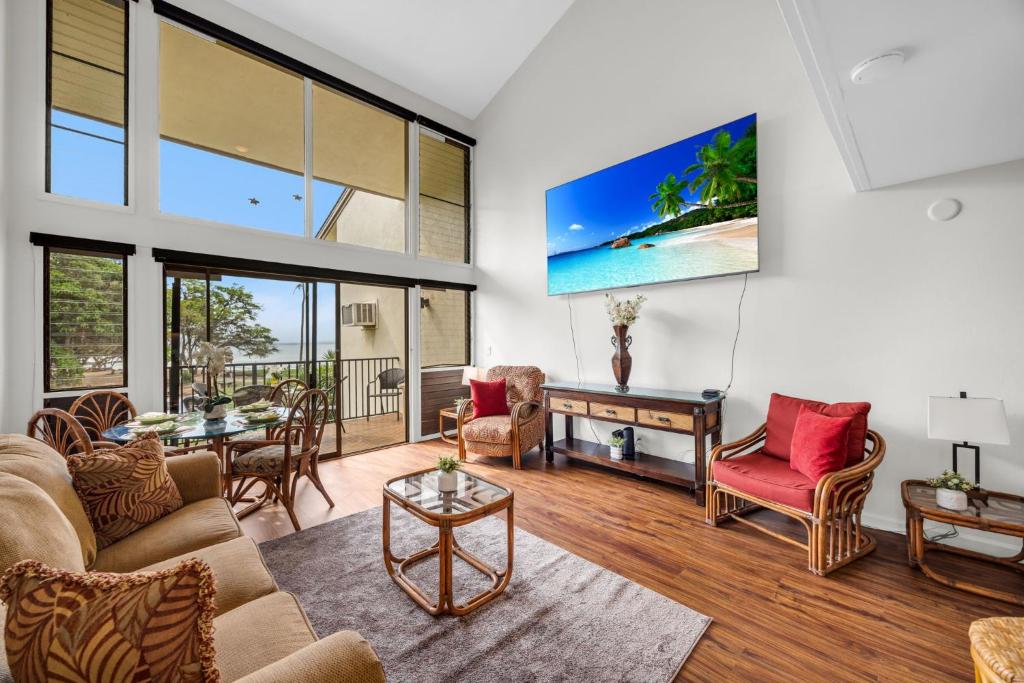 a living room with a couch and a table at Makani A Kai B11 in Wailuku