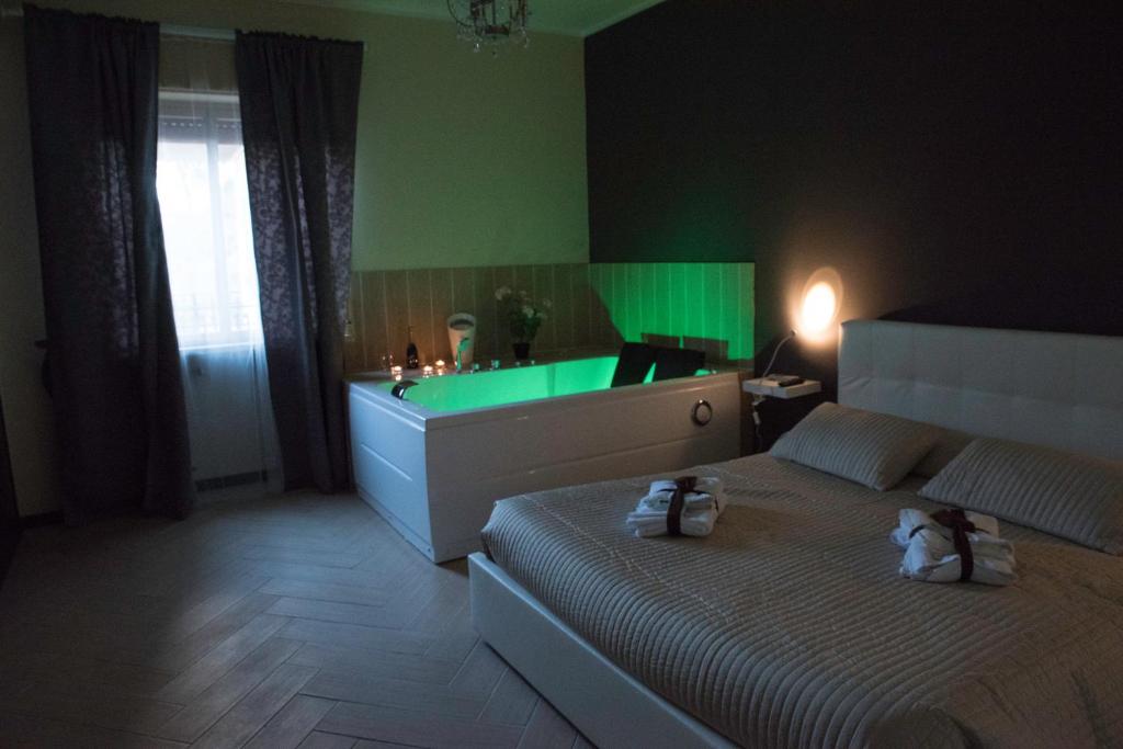 Łóżko lub łóżka w pokoju w obiekcie Il Centro Short Lets