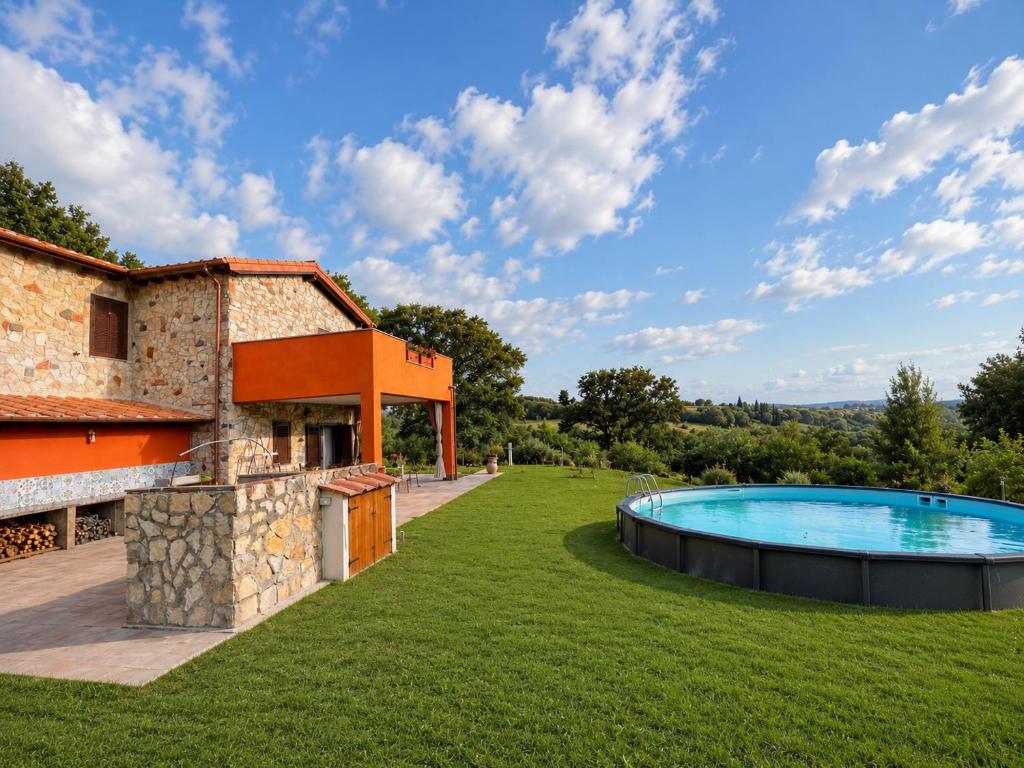an external view of a house with a swimming pool at Scappo in Umbria, Casale Rusinè in Narni