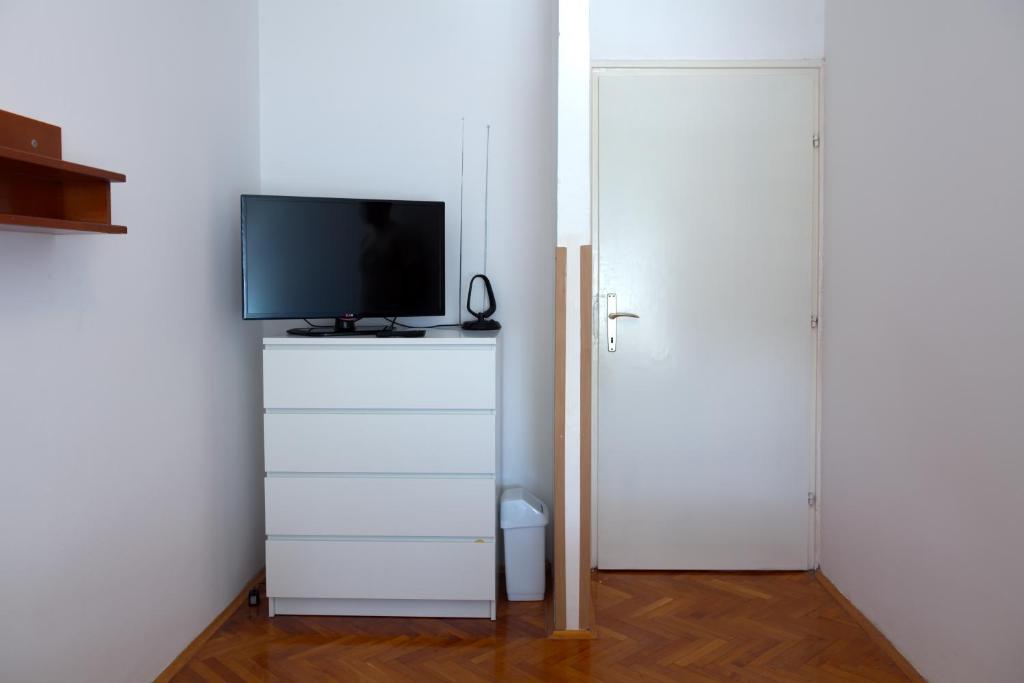 Televízia a/alebo spoločenská miestnosť v ubytovaní Plitvice Apartment