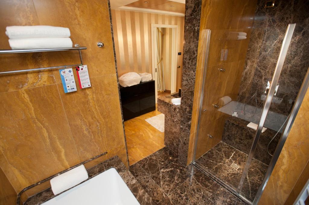 Koupelna v ubytování Hotel Calissano