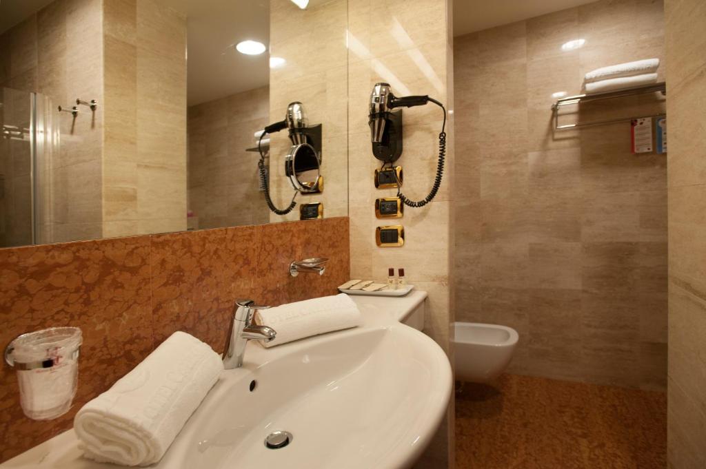 Koupelna v ubytování Hotel Calissano