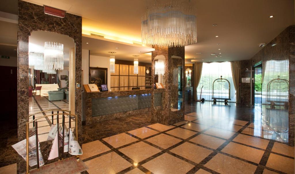 Kuchyň nebo kuchyňský kout v ubytování Hotel Calissano