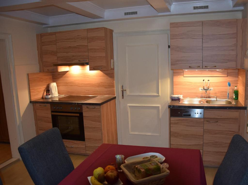 Kuchyň nebo kuchyňský kout v ubytování Ferienwohnung Fürstenbrunn