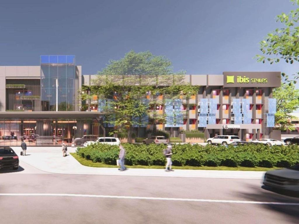 a rendering of a parking lot in front of a building at Ibis Styles Subic in Olongapo