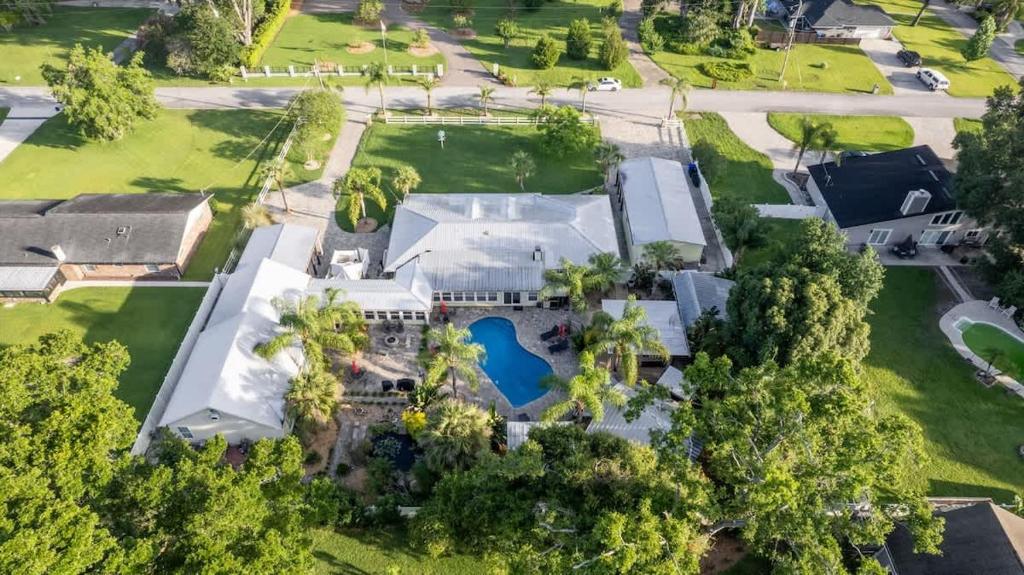 an aerial view of a mansion with a swimming pool at Saint Johns Oasis - Pool Hot Tub Grill in Jacksonville