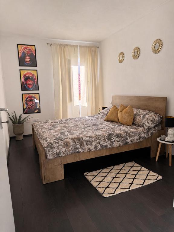 a bedroom with a large bed in a room at Lalya App in Vodnjan