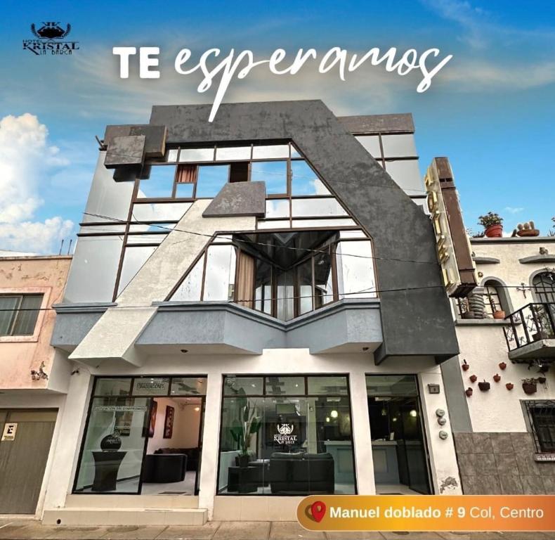 a building with the word t experience on the front at Hotel kristal in La Barca