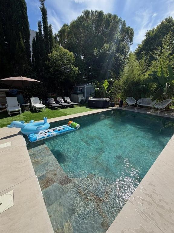 Maison de ville Rez-de-chaussée avec piscine face a l'arbre