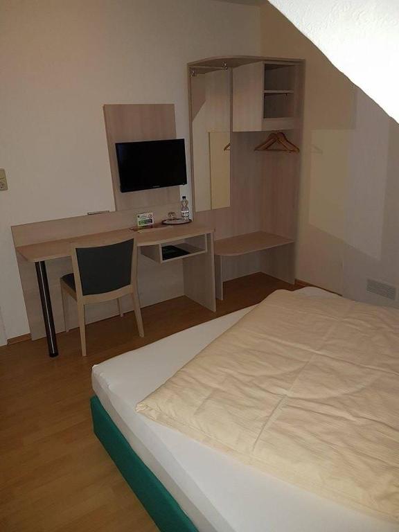 Postel nebo postele na pokoji v ubytování Hotel Linden